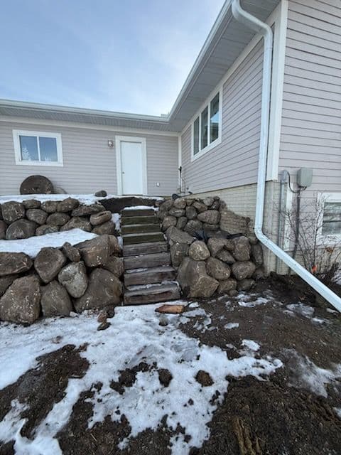 Gallery photos for Boulder Retaining Wall Enhances Winter Charm: Image #3