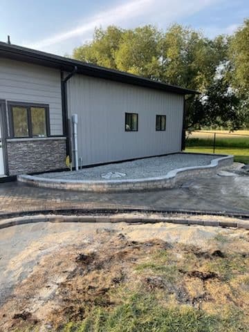 Expertly Crafted Paver Walkway and Patio Transformation