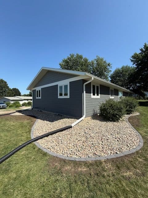 Sioux Center Home Enhanced with Rock and Walkways image