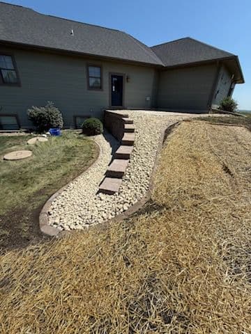 Gallery photos for Revamped Retaining Wall with Modern Rocks: Image #1