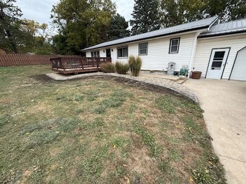 Gallery photos for Elegant Yard Transformation with Rock Beds and Edging: Image #3
